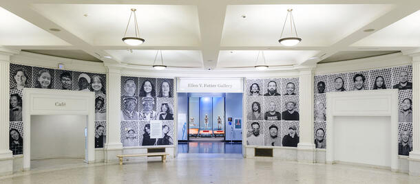 Larger-than-life portraits line the walls and doorways of the Museum's Ellen Futter Gallery.