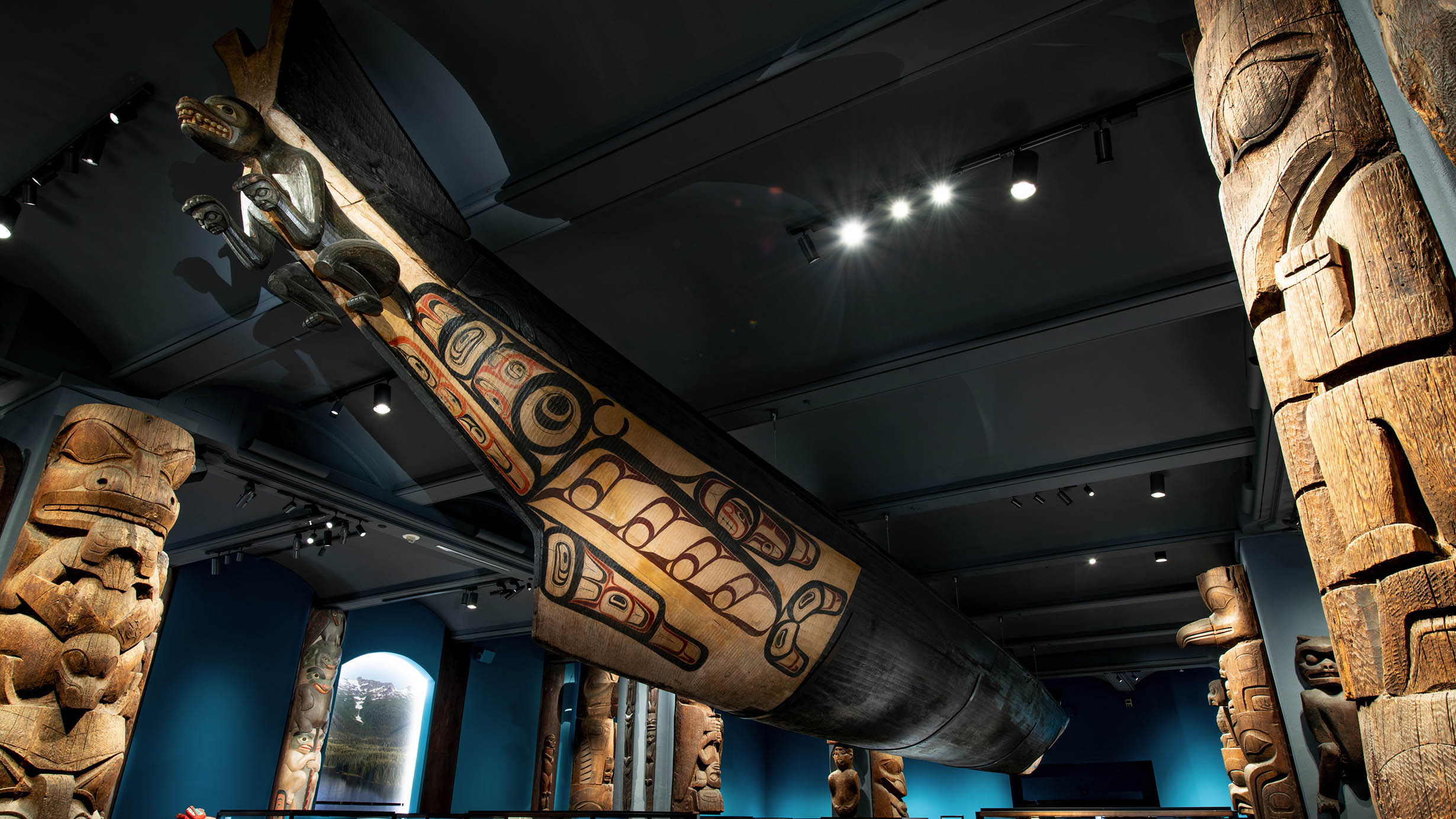 An immense wooden canoe with a prow carved in the form of a wolf hangs from the ceiling of the Museum's Northwest Coast Hall.