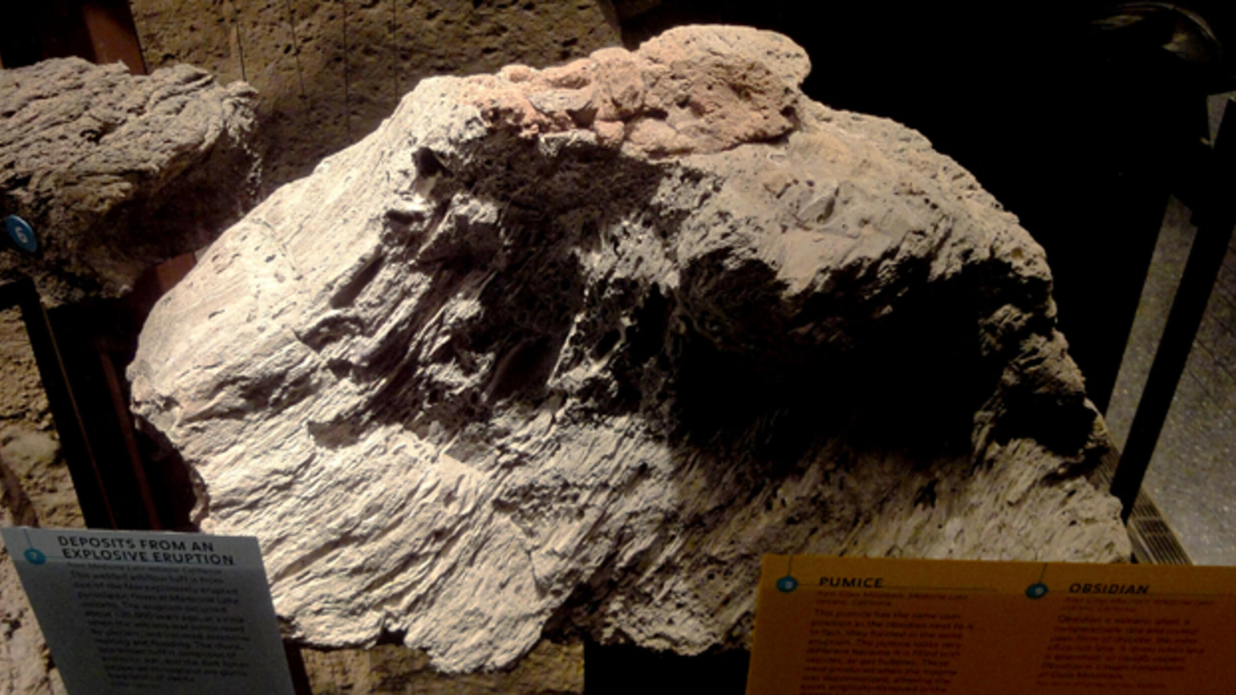 A large rock formation with an irregular surface, located in the Museum’s Hall of Planet Earth.