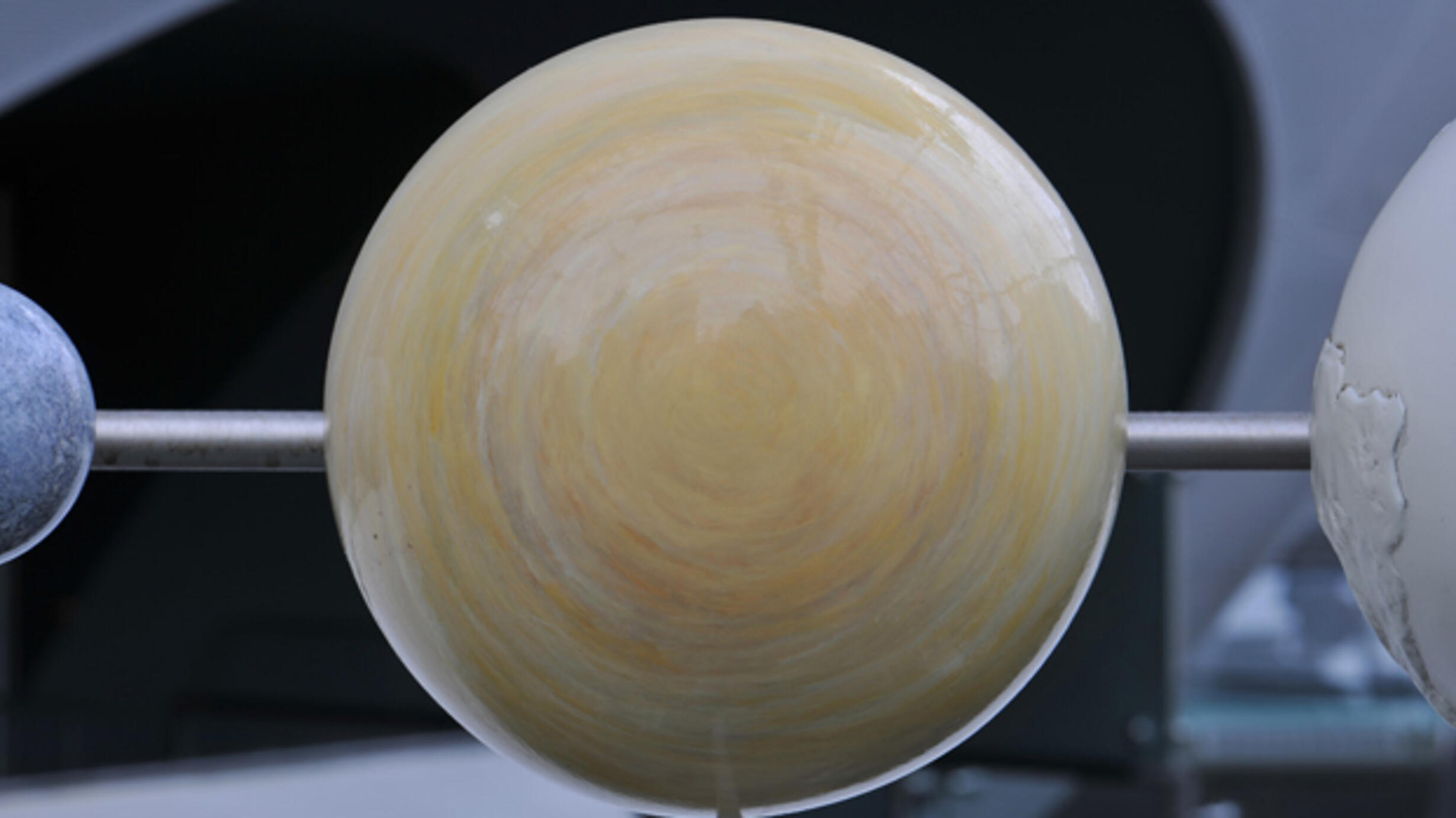 A close-up of a model of the planet Venus.