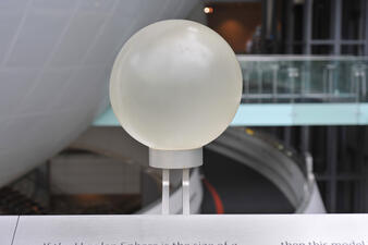 A sphere on an exhibition stand on the second floor of the Museum’s Rose Center for Earth and Space.