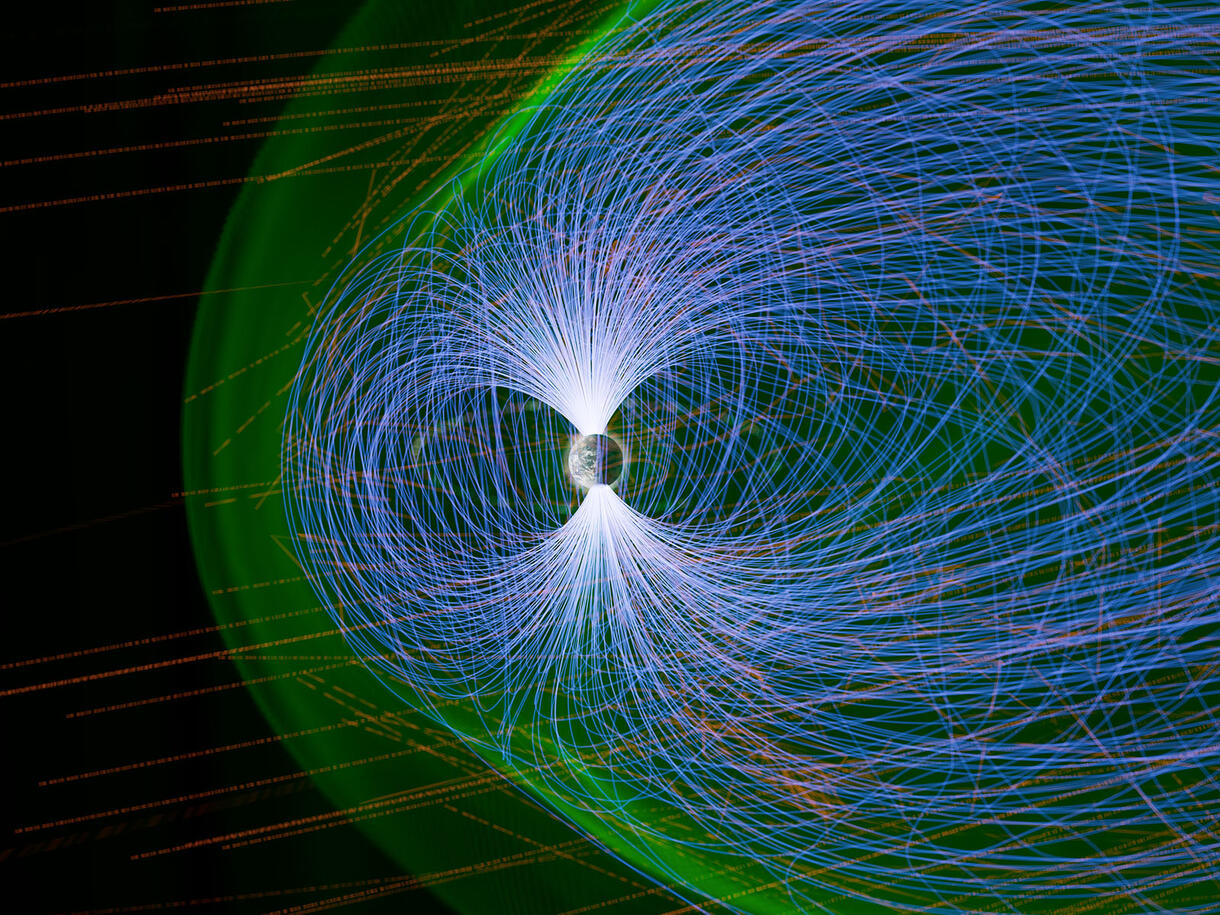 Colored lines in different patterns are used to depict Earth's protective magnetic field.