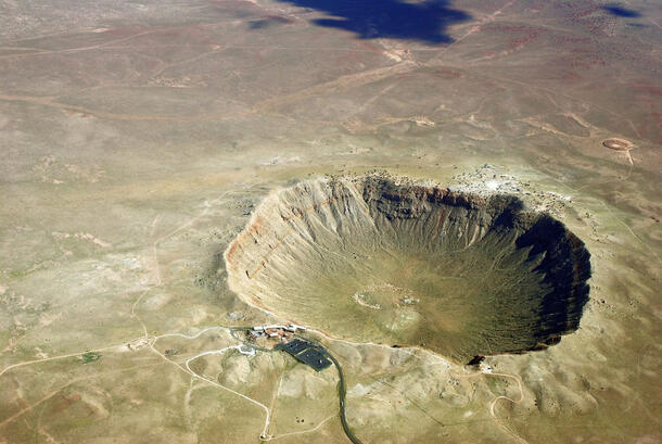 Overhead shot of a large meteor crater. 