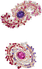Two clips with colorful sapphires, rubies and diamonds set in a swirling design, evoking stars in a spiral galaxy.