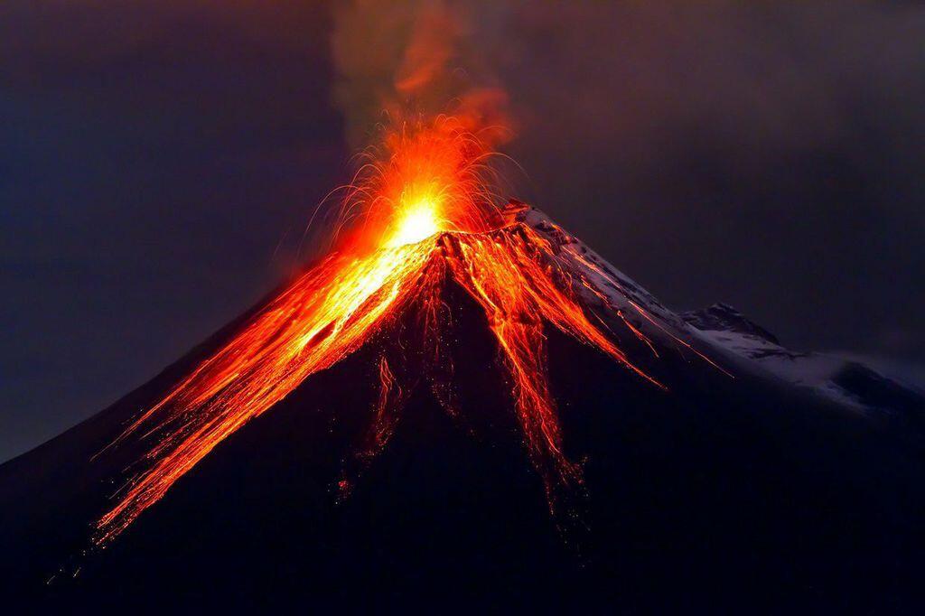 Photograph of an erupting volcano.