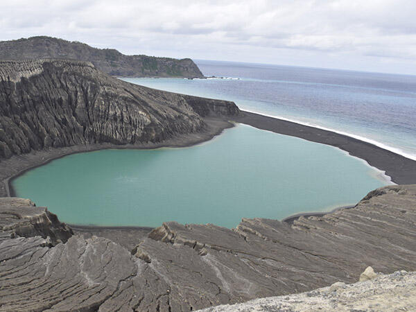 Lake inside the crater of a partially submerged volcano.
