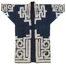 A dark blue cotton coat with white patterning. 