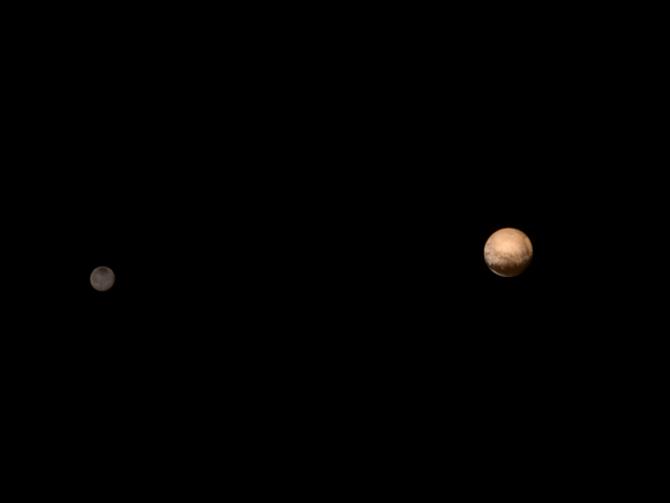 A visualization of Pluto and its moon Charon against black outer space.