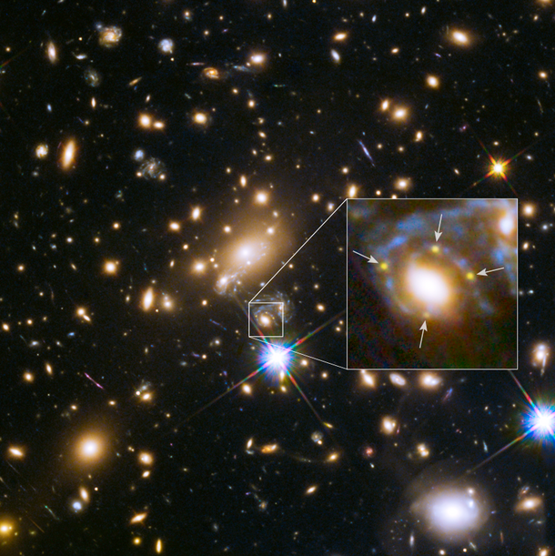 Supernova split into four images as seen by Hubble Space Telescope.