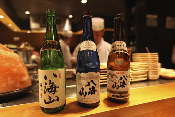 Three Hakkaisan bottles (sake)