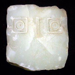 eye-idol of caved stone