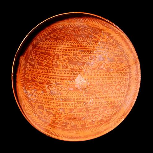 clay bowl, decorated with dark red designs