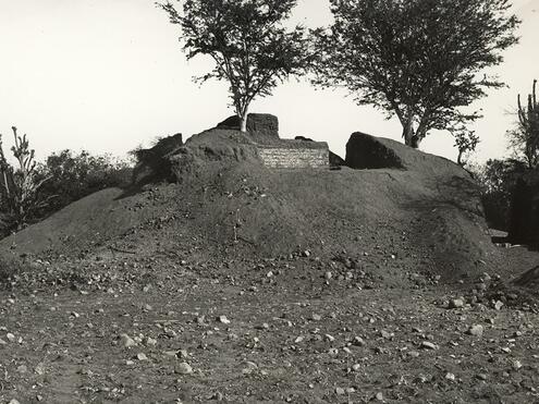 tip of a structure coming out of dirt