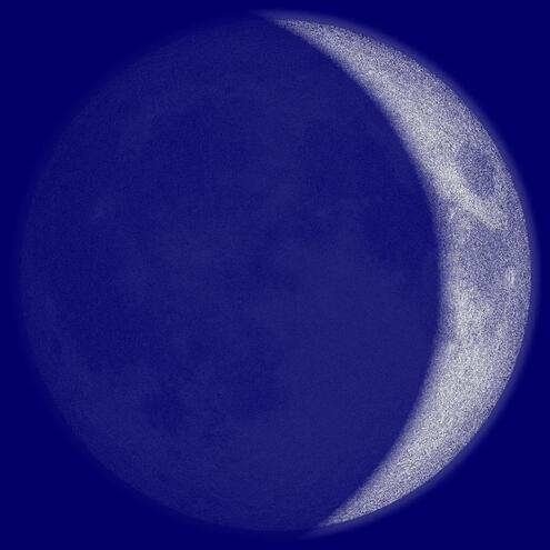 Moon showing only a thin, crescent shape of illumination on its right side. 
