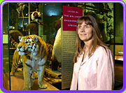 Eleanor in front of display in the Hall of Biodiversity