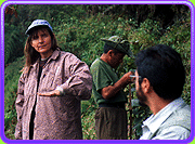 Eleanor in the field talking to two team members