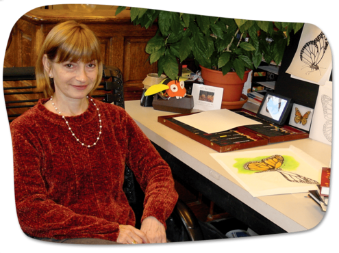 Ivy Rutzy, scientific illustrator, at her desk