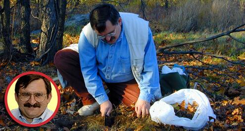 Vladimir Ovtsharenko kneeling among leaves and grass to catch spiders in a wooded area, along with a small inset headshot of Vladimir.