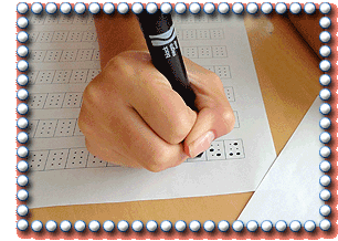 Close-up of hand translating the note into the appropriate braille dots