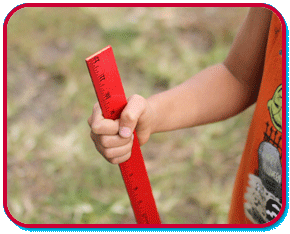 ruler caught in a hand