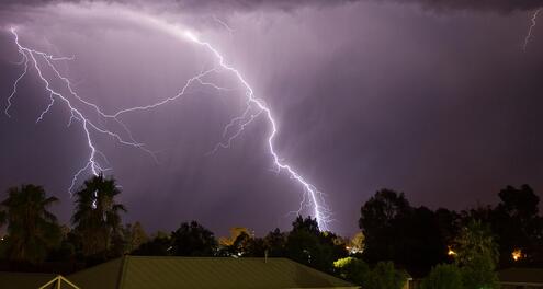 Thunderstorm in a town at night