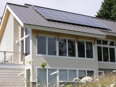 house with solar panels on roof