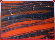 black and red striations showing rock layers