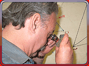 Ed examining rock with a loupe