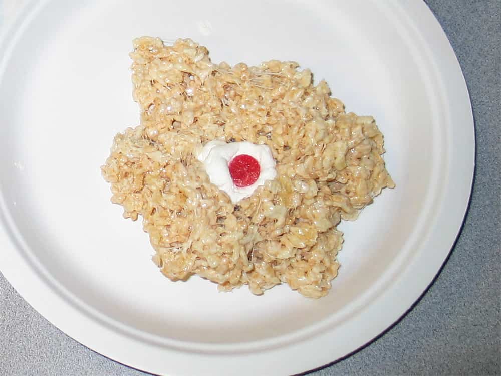 a blob of Rice Krispie mixture with the marshmallow core placed into the center