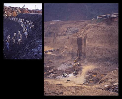 vast open area at entrance to mine with many people working