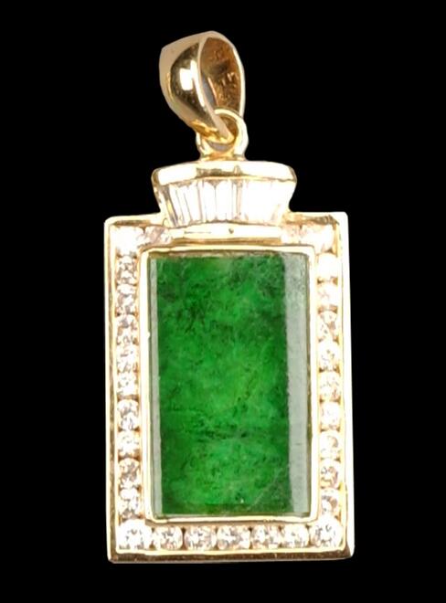 gold pendant with rectangular jade stone in emerald green color