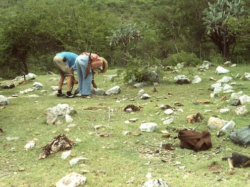 picking through stones on the surface to find jade