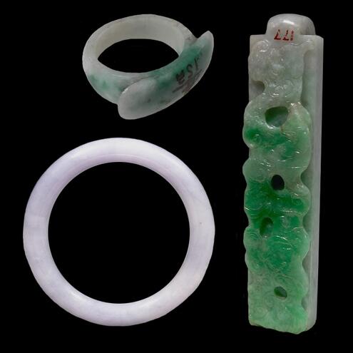 a jade bangle, pendant and ring