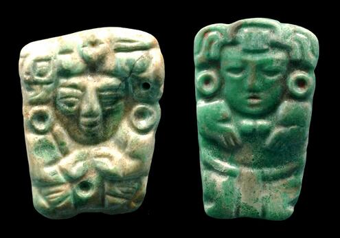 carved jade pendants with faces