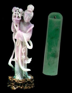 lavender jade figurine and dark green jade pendants