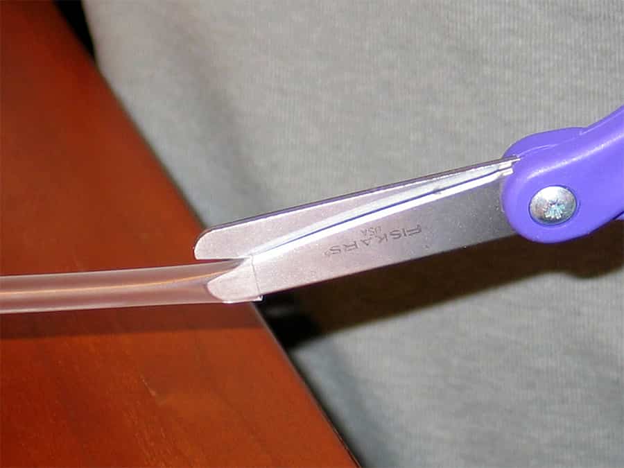 cutting slits into end of straw