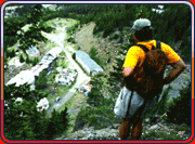 Ed surveying landscape from a cliff
