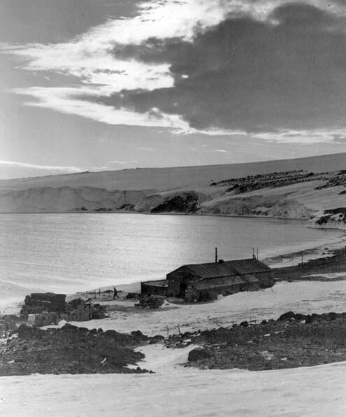 long wooden hut near shoreline