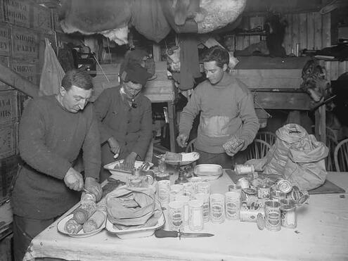 cutting food on table of provisions