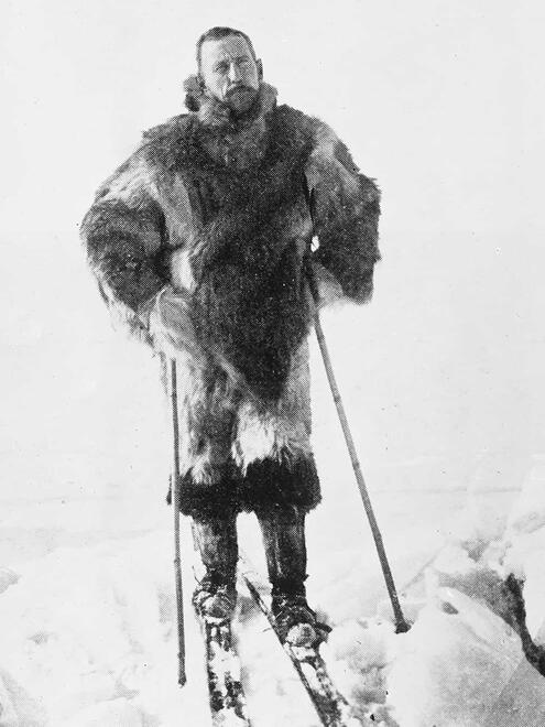 Captain Amundsen on skis wearing fur gear