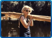 Melanie carrying large fishing nets