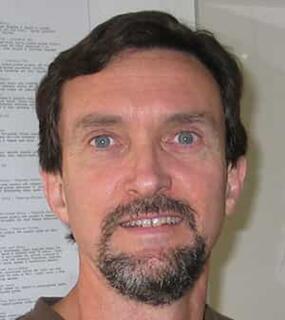 head shot of Jim Webster smiling