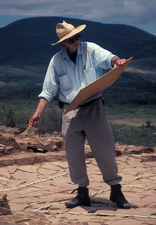 Chuck Spencer drawing in the field