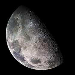 moon half lit and half in shadow