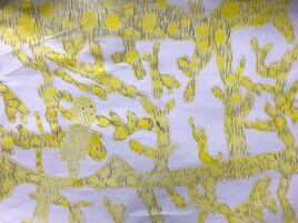 drawing of yellow pygmy seahorses blending in to yellow coral