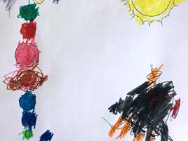 drawing of planets in solar system and a rocket ship