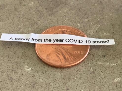 A penny minted in 2019, the year COVID started