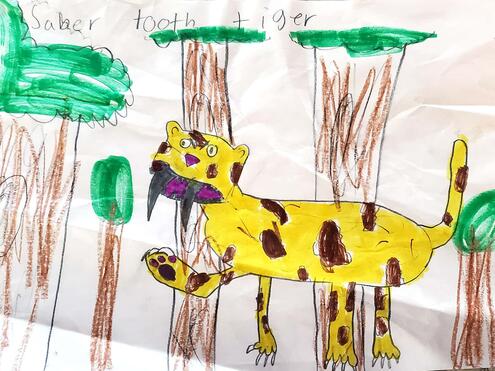 drawing of a saber-toothed tiger in the woods
