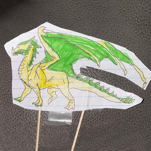dragon drawing on two sticks