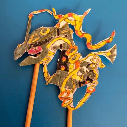 mythic dragon puppet on 2 sticks